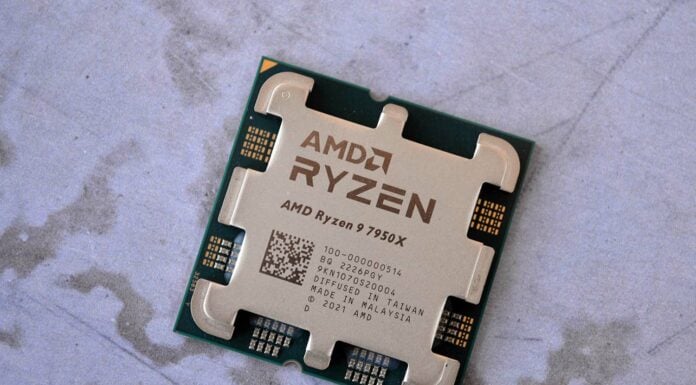 The AMD Ryzen 9 7950X lying on a marble table.