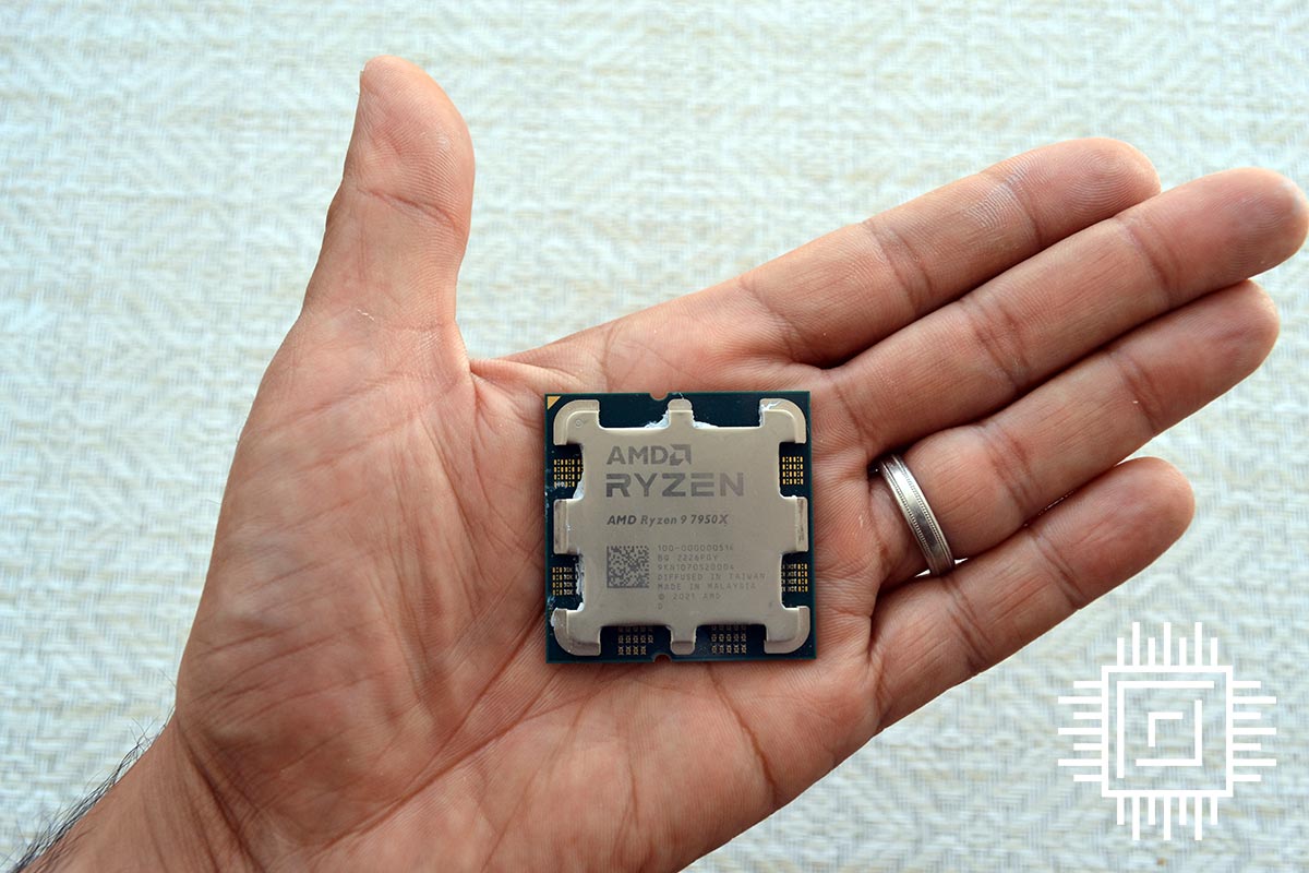 AMD Ryzen 9 7950X3D in the hand.