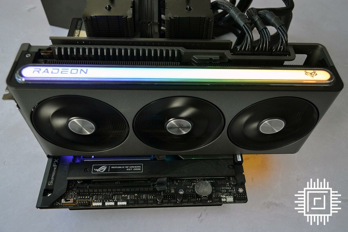 The Sapphire Nitro+ AMD Radeon RX 7900 XTX Vapor-X with RGB lights shining on top.