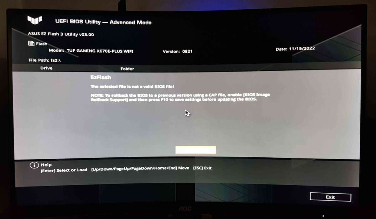 The Asus TUF Gaming BIOS with an error message displaying that the selected file is not a valid BIOS file.