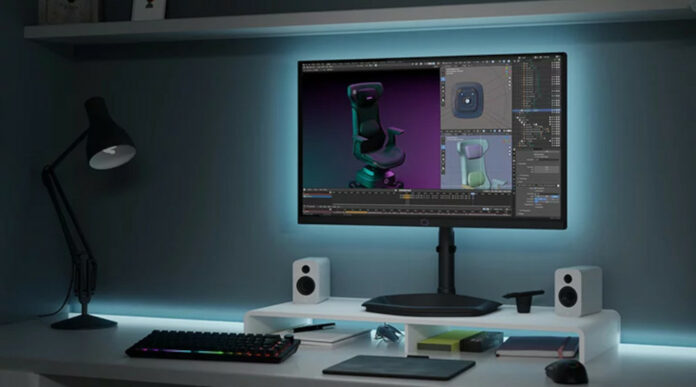 Cooler Master Tempest GP2711 Mini-LED gaming monitor on top of a desktop alongside PC peripherals