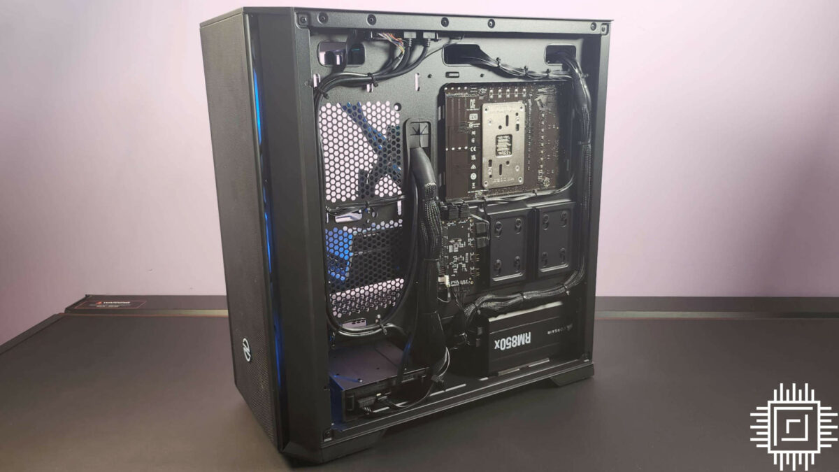 Behind the motherboard of the PCSpecialist Odin TX gaming PC, showcasing impeccable cable management.