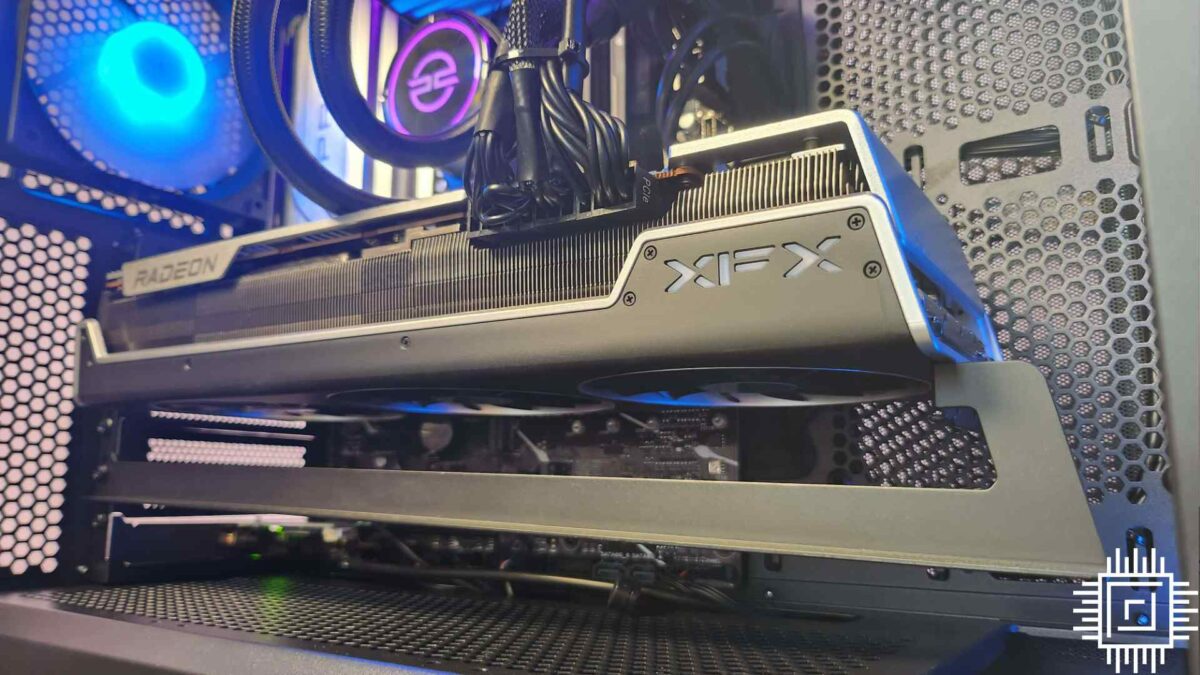 A close-up of the XFX AMD Radeon 7900 XTX graphics card inside the PCSpecialist Odin TX gaming PC.