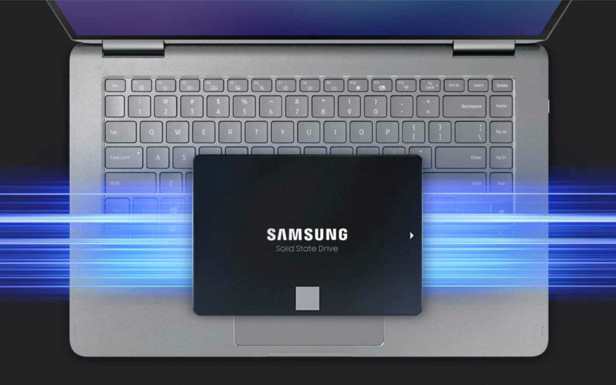 Samsung 870 SATA SSD sat on top of a laptop keyboard.
