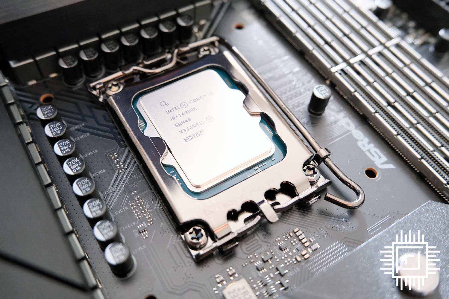 Intel Core i9-14900K CPU sitting in a motherboard.