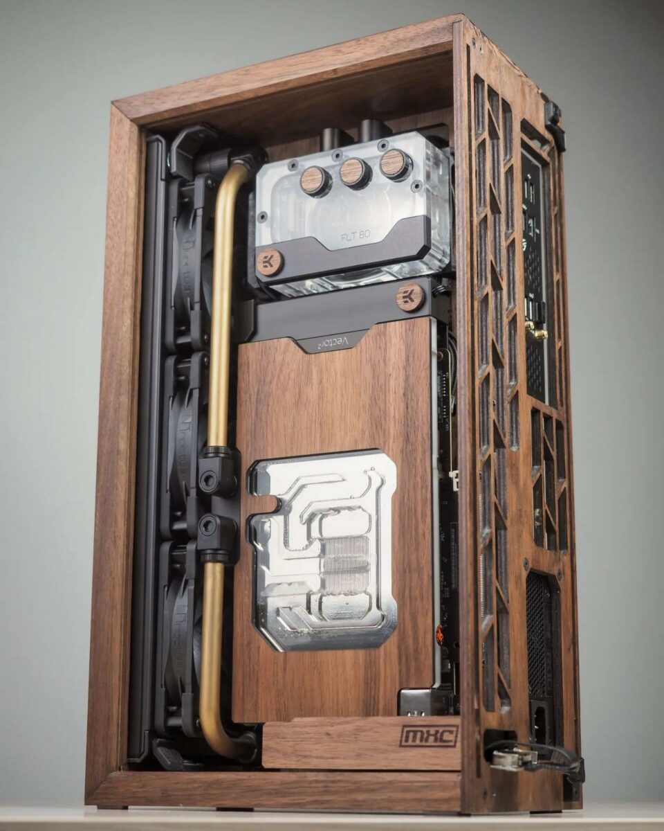 A small form factor computer chassis made from wood.