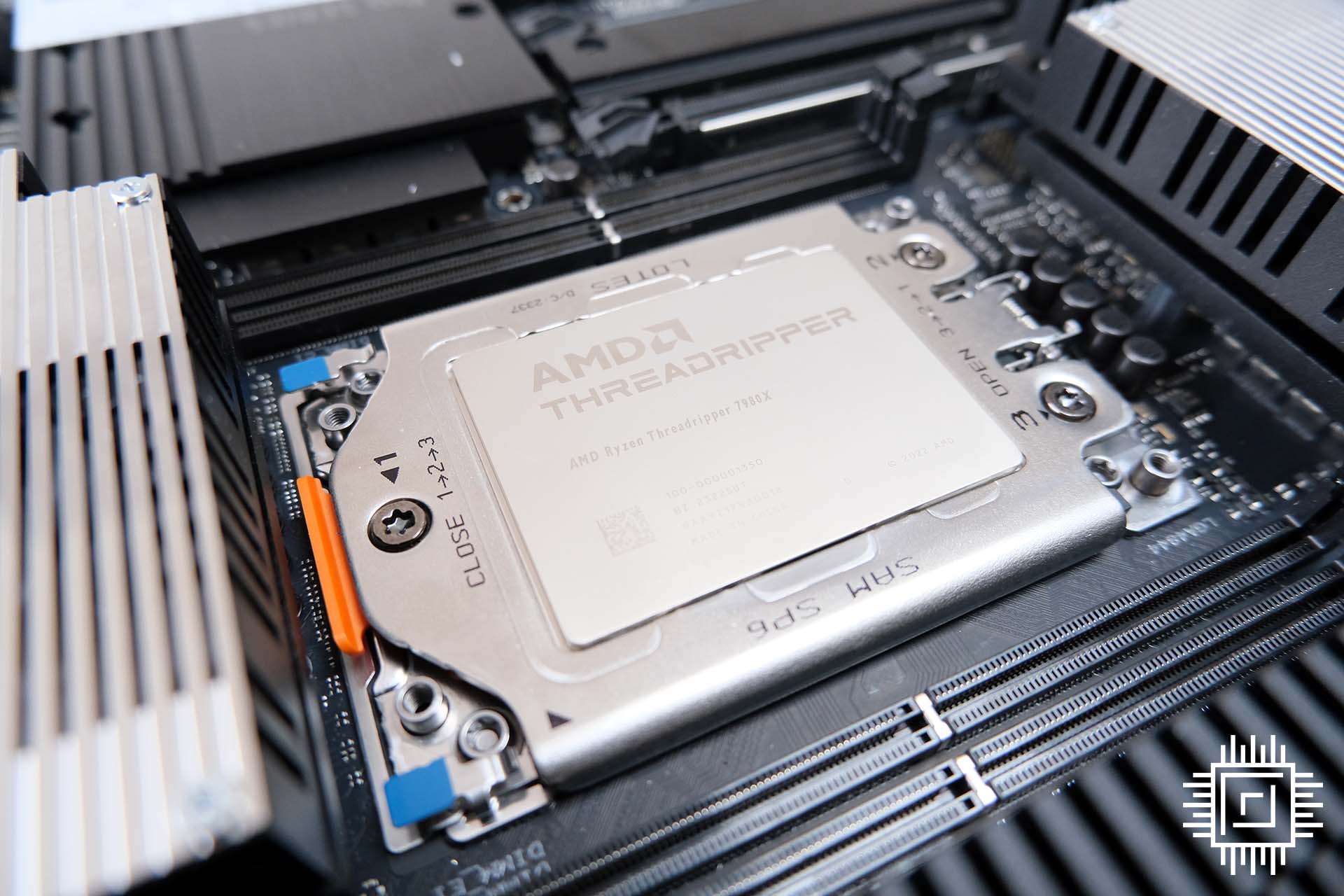 AMD Ryzen Threadripper 7980X secure in the motherboard's socket.