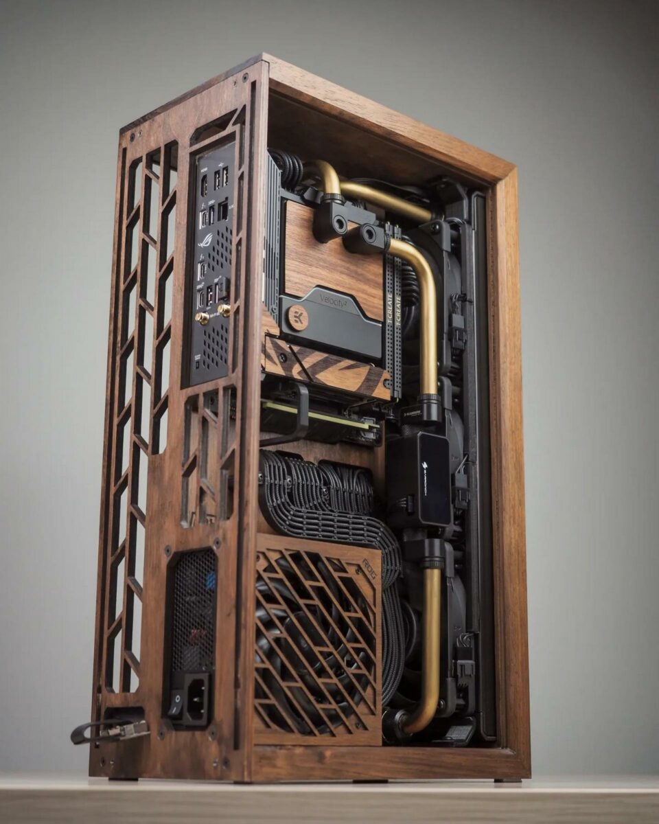 Cable management on a small form factor computer chassis made from wood.