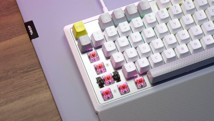 Corsair K70 Core SE PR 2 Corsair K70 Core SE gaming keyboard with some keycaps removed to reveal Red mechanical switches.