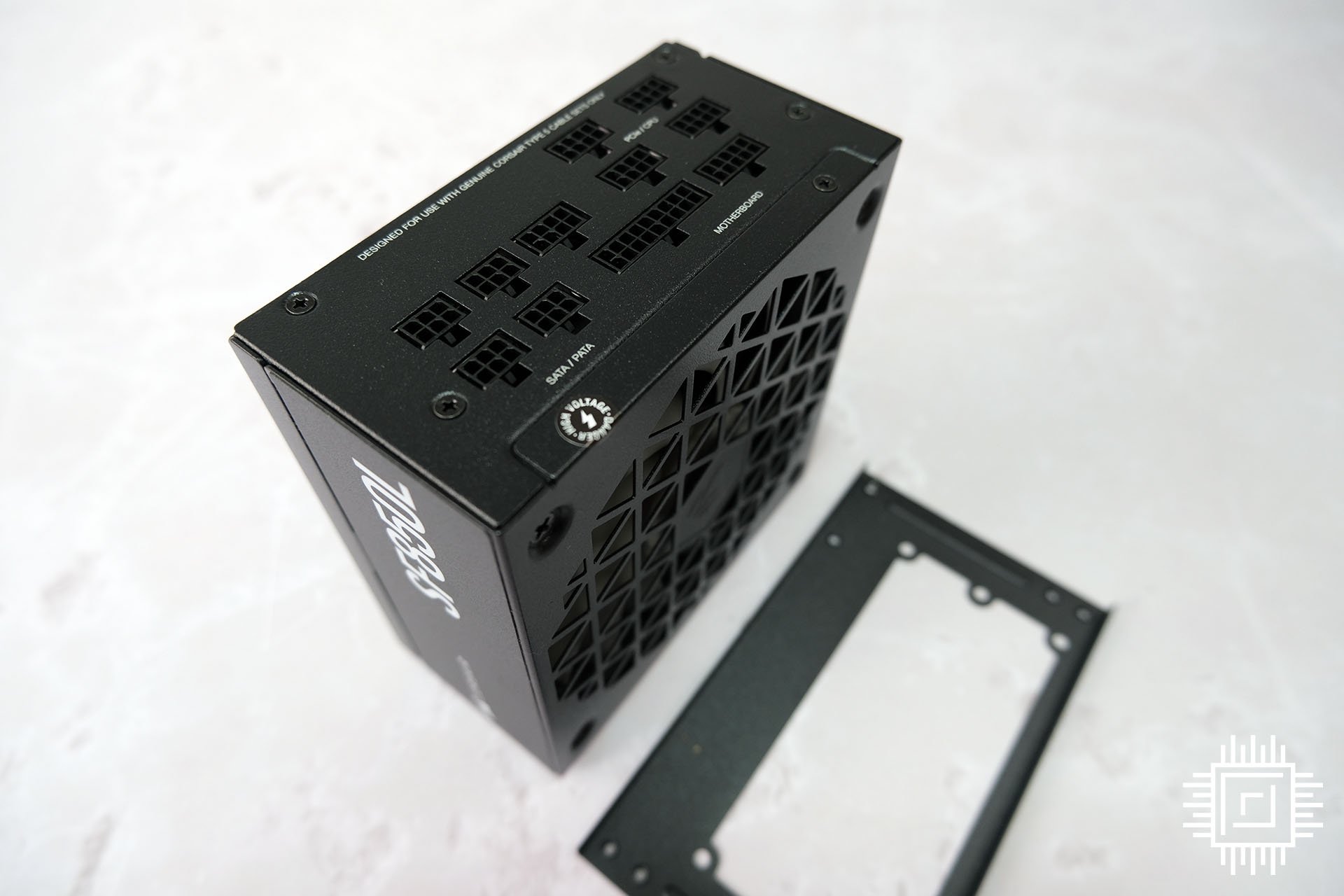The Corsair SF850L with ATX bracket on display.