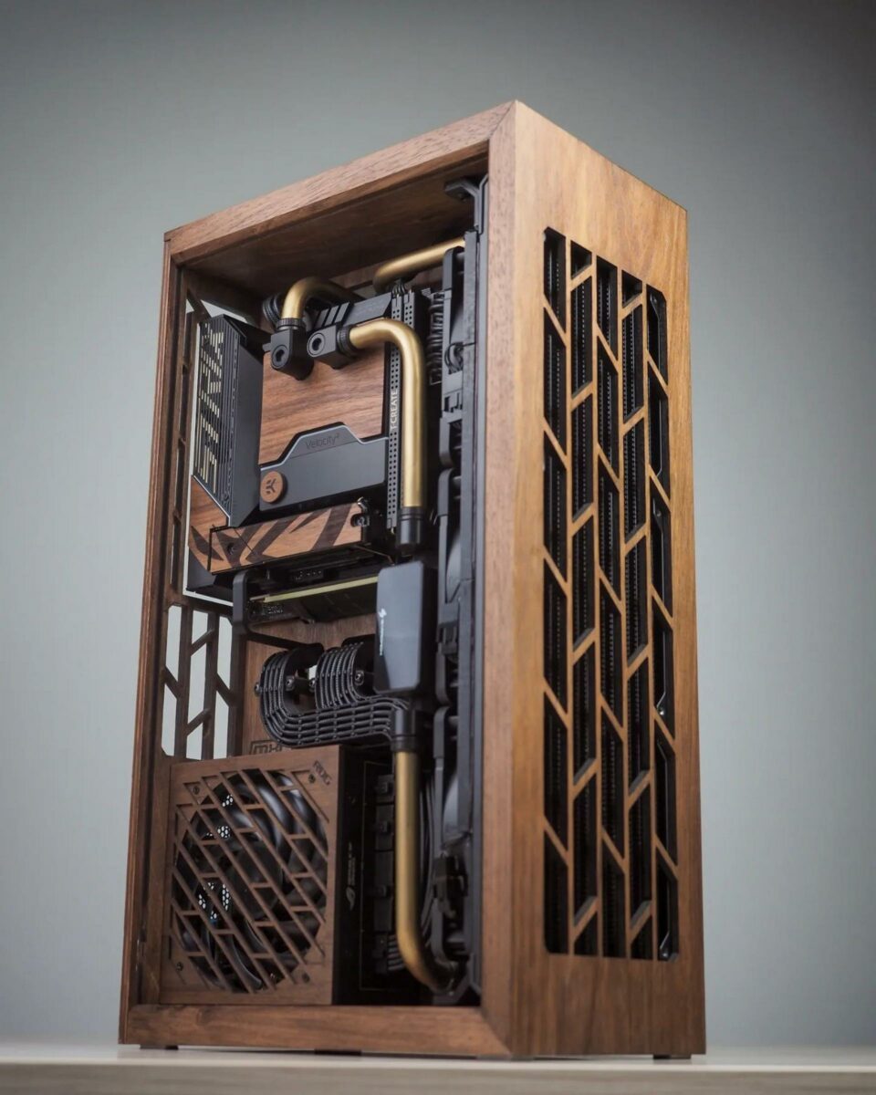 The side of a small form factor computer chassis made from wood.