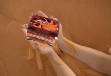 Thermalright Full Coper cooler, amidst reddish brown sand background.