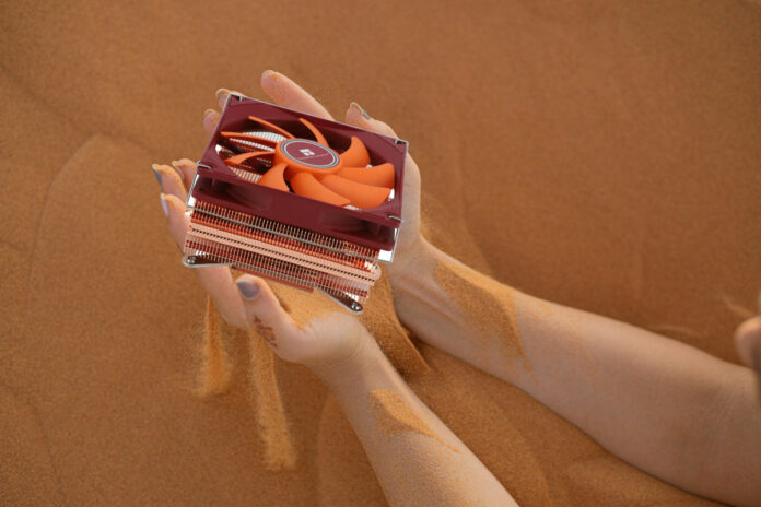 Thermalright Full Coper cooler, amidst reddish brown sand background.