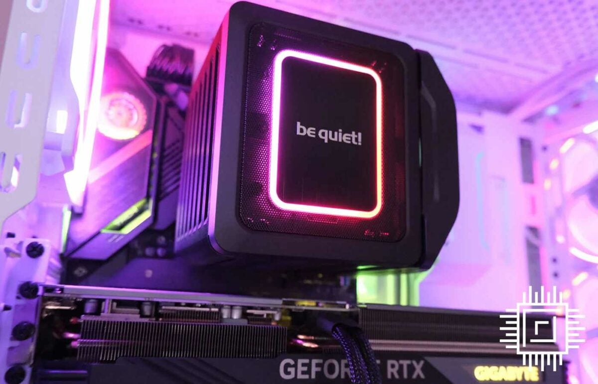 Our best CPU cooler for air cooling, be quiet! Dark Rock Elite, glowing pink and orange in a gaming PC.