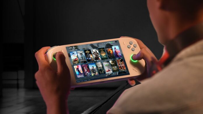 A player using Aokzoe A2 gaming handheld.