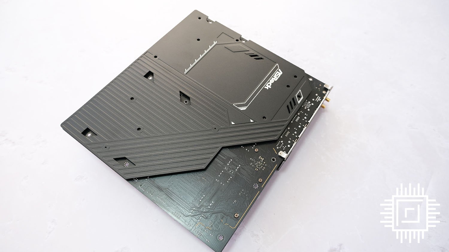 ASRock TRX50 WS has a large rear holding brace for increased rigidity.