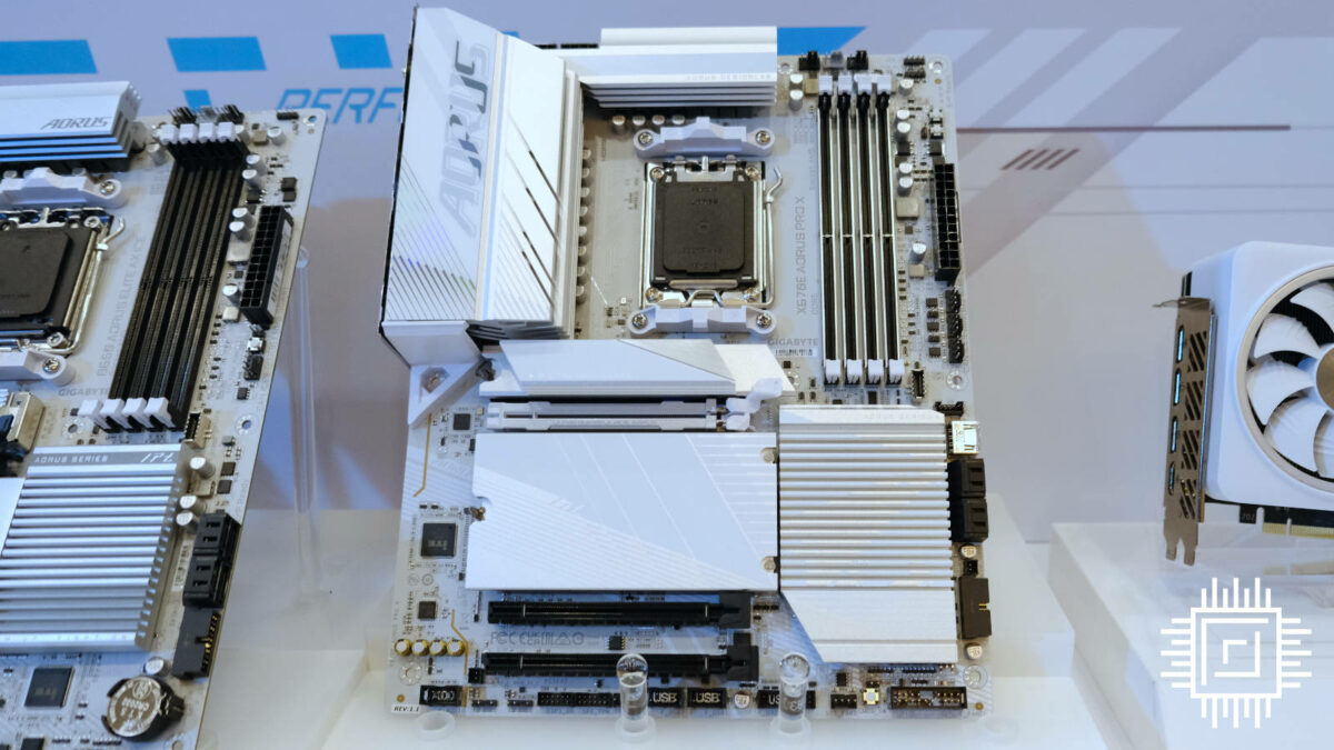 Gigabyte's ice white X670 Aorus Pro X motherboard with black PCIe and RAM slots.