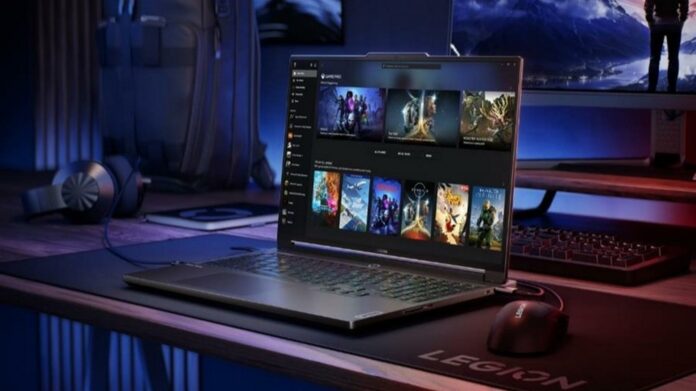 Lenovo Legion gaming laptop on a desk connected to an external display and peripherals.