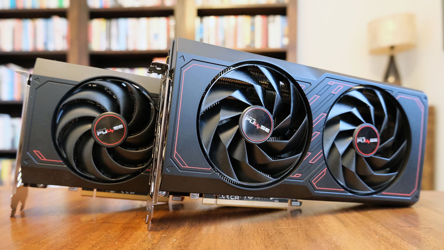 Sapphire Radeon RX 7600 XT Pulse 16GB and 8GB Pose Together.