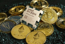 AMD Ryzen 9 7950X CPU on top of cryptocurrency coins.