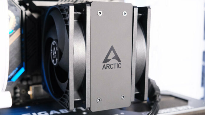 Arctic Freezer 36 mounted to a PC with two fans either side of the tower.