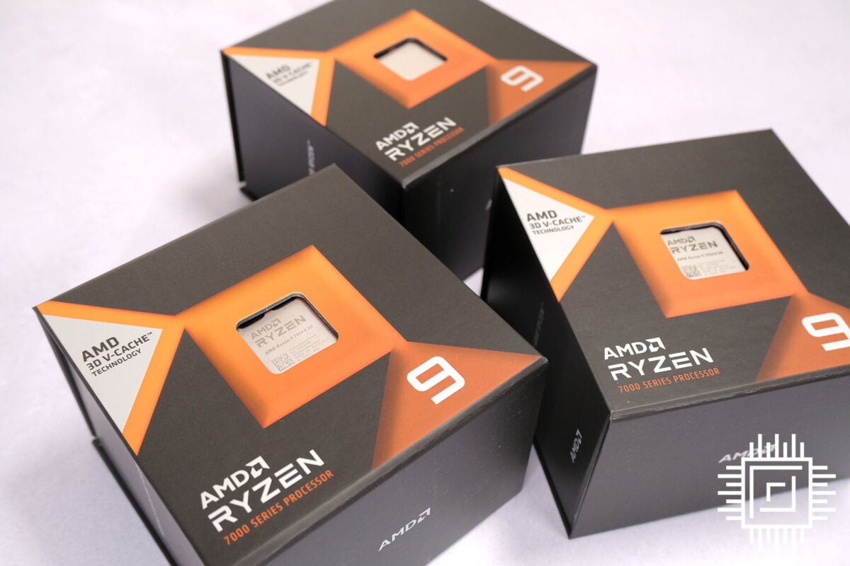 Three boxed AMD Ryzen 9 7950X3D CPUs laid flat.