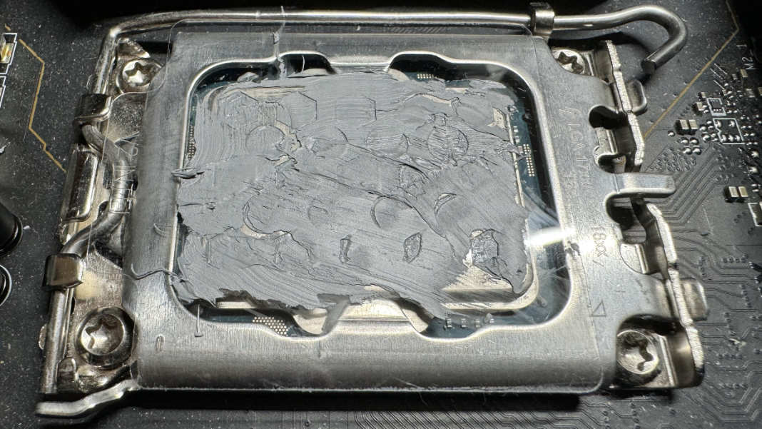 X-Apply thermal paste stencil application with compound smothered all over.