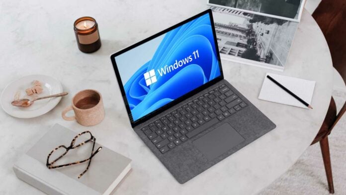 Windows 11 logo on a Surface tablet.