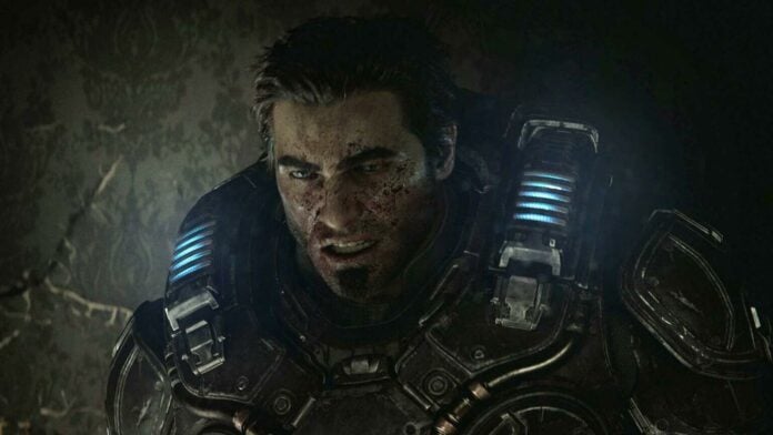 Marcus Fenix, protagonist of Gears of War: E-Day, with a pained expression on his blood-spattered face