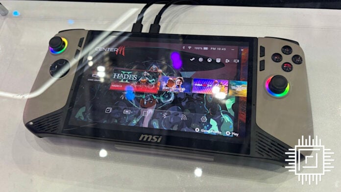 MSI Claw 8 AI Plus handheld, behind a reflective glass cover