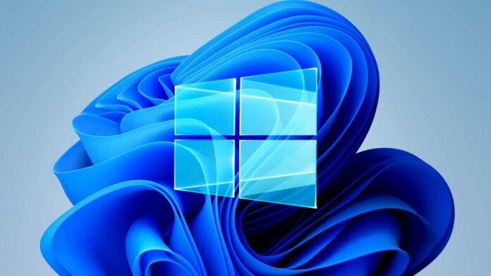 Windows 11 background with the Windows 10 logo on top.