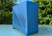 Fractal Design Era 2 review: a souped-up successor Fractal Design Era 2 atop a glass surface, against a background filled with green plants.