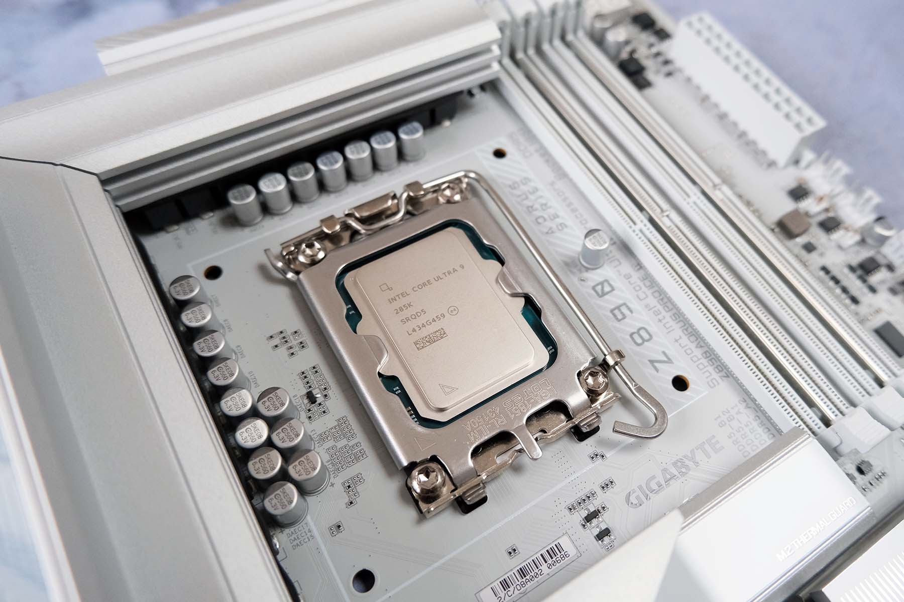 A picture of the Intel Core Ultra 9 285K on a Gigabyte Z890 Pro Ice motherboard.