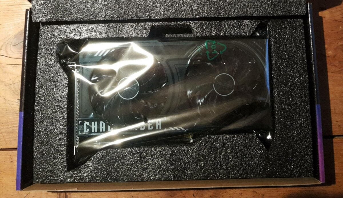ASRock Intel Arc B570 Challenger graphics card in a box.