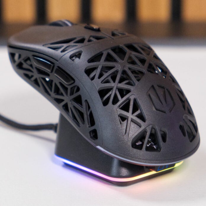 Endorfy Liv Plus Wireless gaming mouse sitting on its RGB charging dock.