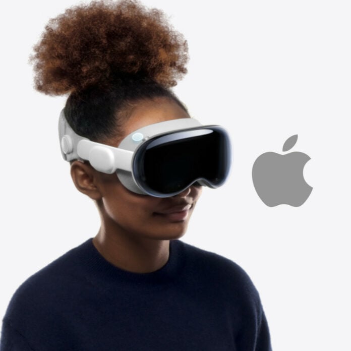 Apple Vision Pro wearer looking at a grey Apple logo.