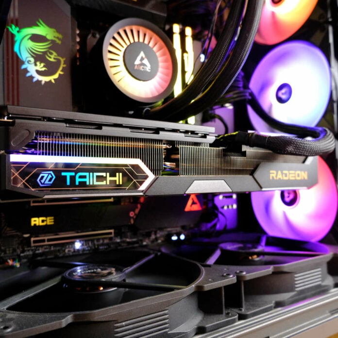 ASRock Radeon RX 9070 XT Taichi OC graphics card powered on in a PC.