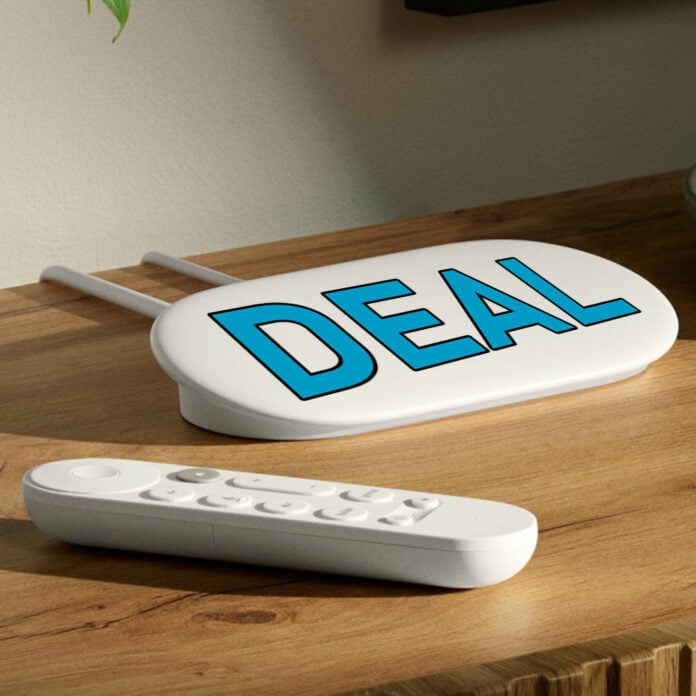 Google TV Streamer resting on a wooden surface, with the word 'deal' superimposed on it in blue.