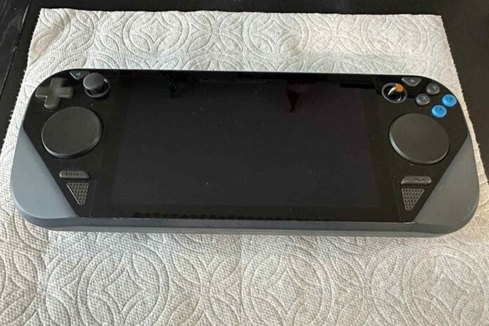 Prototype Steam Deck from an Ebay listing, lying on top of a paper towel.