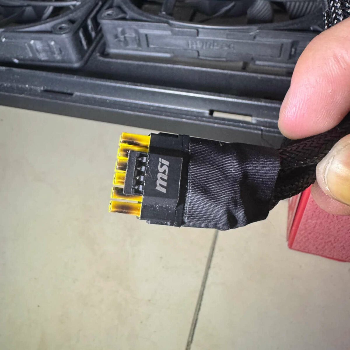 Burned yellow 12V-2x6 power cable.