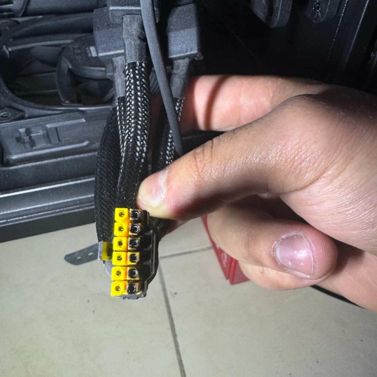Burned yellow 12V-2x6 power connector.