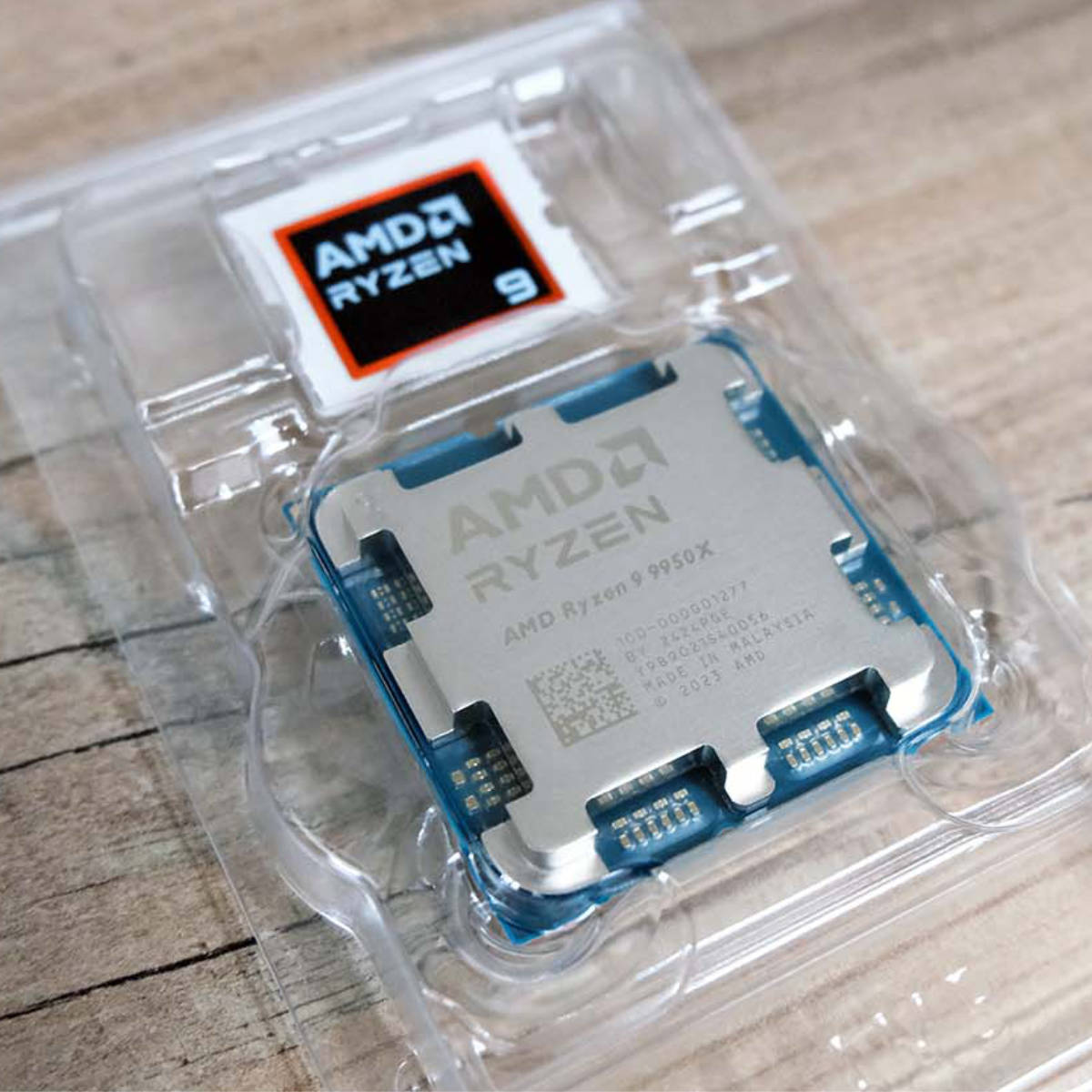 AMD Ryzen 9 9950X resting in its packaging.