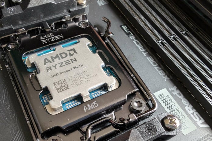 Ryzen 9 9900X processor sitting in an ASRock X870E Taichi Lite motherboard.