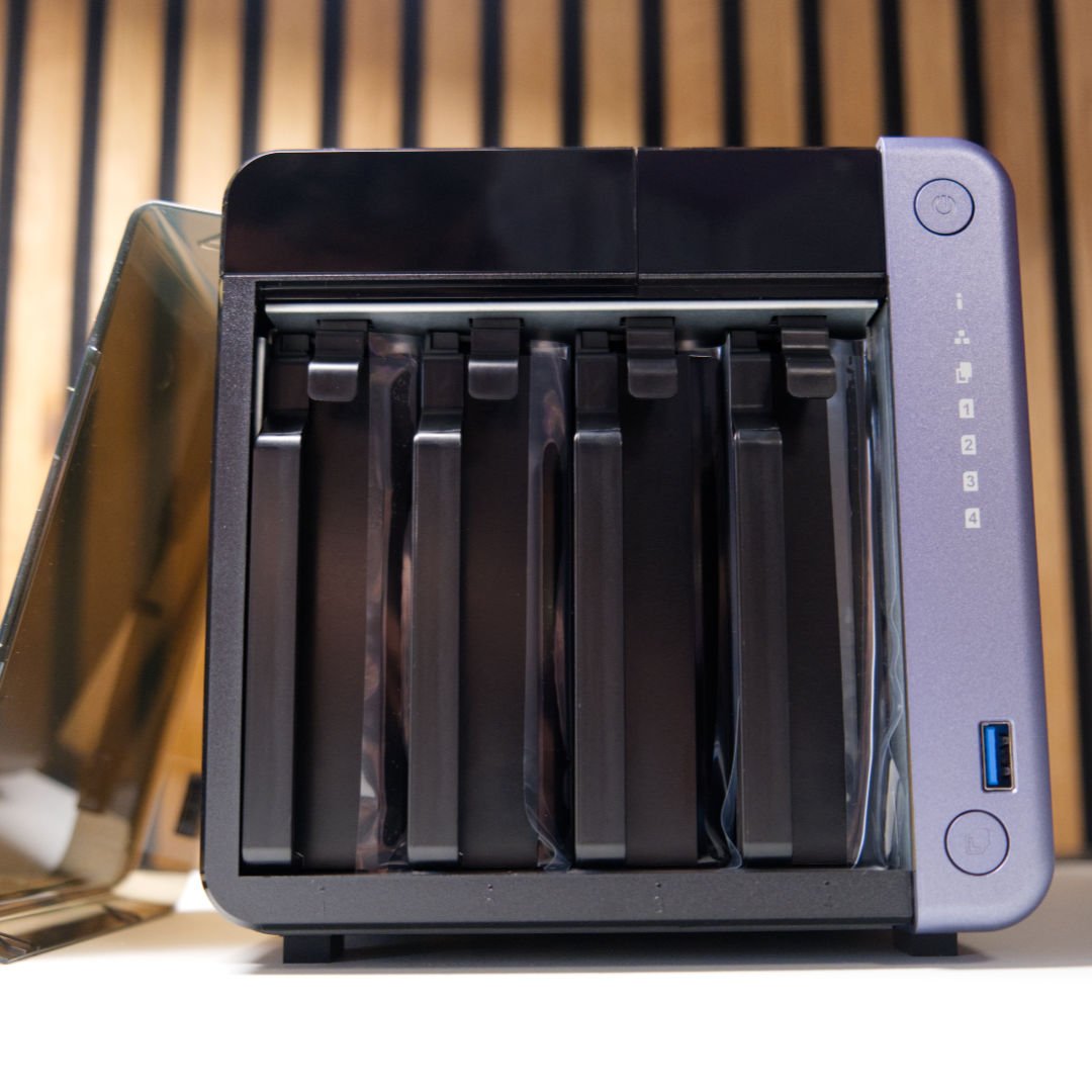 QNAP TS-432X with front panel open.