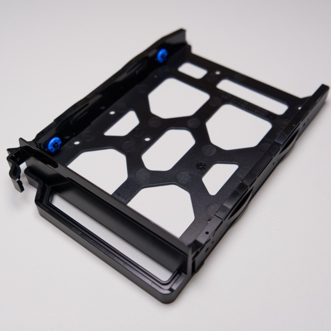 QNAP TS-432X empty HDD tray.