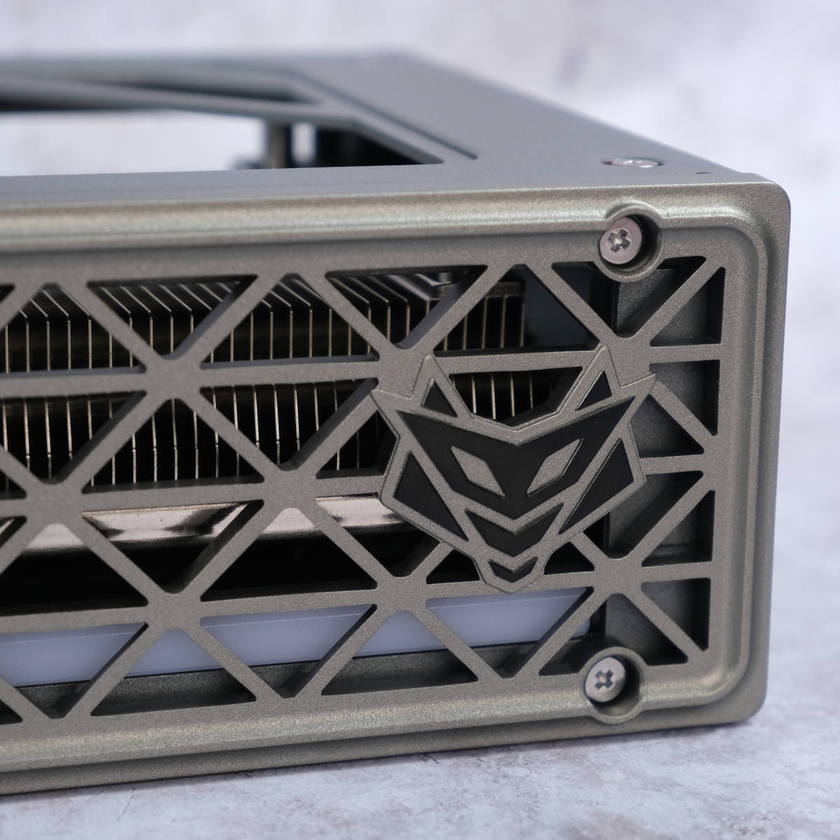 Close up of Nitro+ 'Shield' logo on the side of Sapphire Nitro+ Radeon RX 9060 XT 16GB.