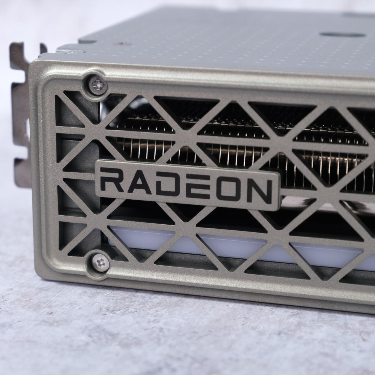 Close up of Radeon logo on the side of Sapphire Nitro+ Radeon RX 9060 XT 16GB.