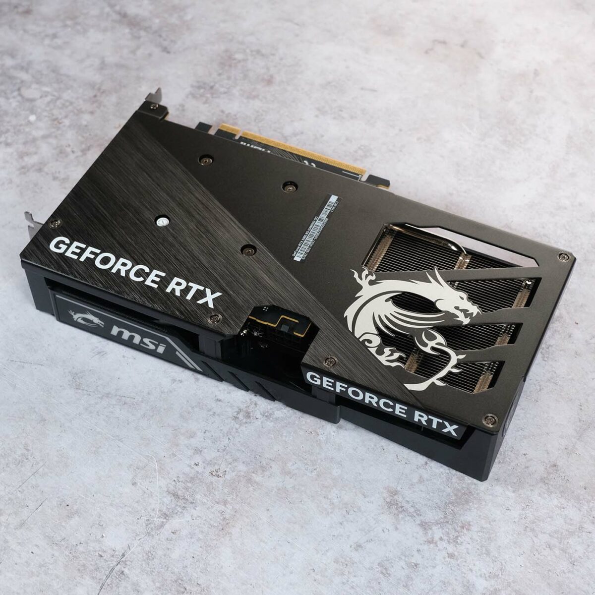 Wide shot of MSI GeForce RTX 5060 Gaming OC, showcasing its backplate design.
