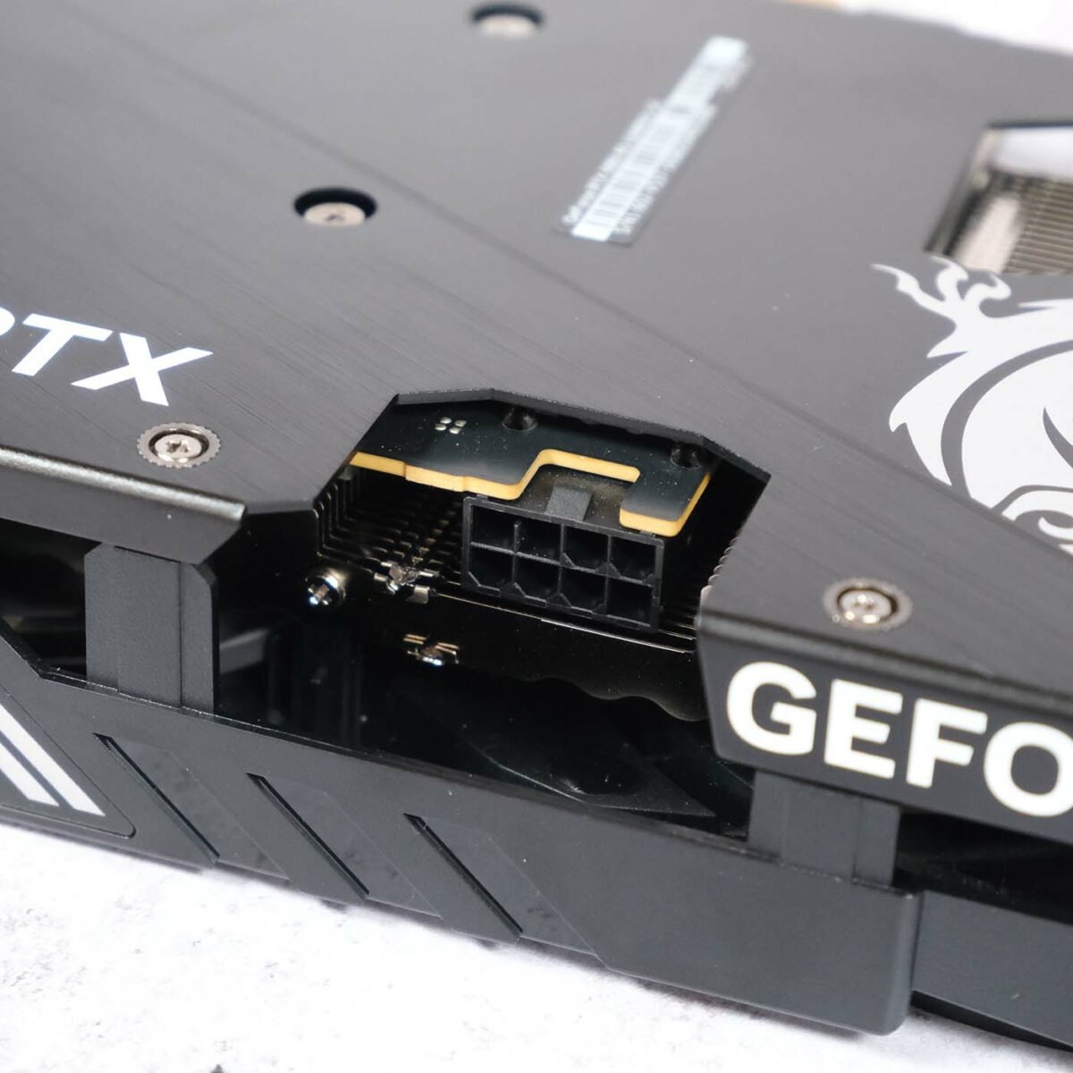 Close up of 8-pin power connector on MSI GeForce RTX 5060 Gaming OC.