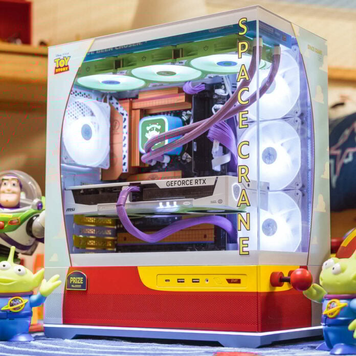 MSI Toy Story PC, surrounded by figures from the series.